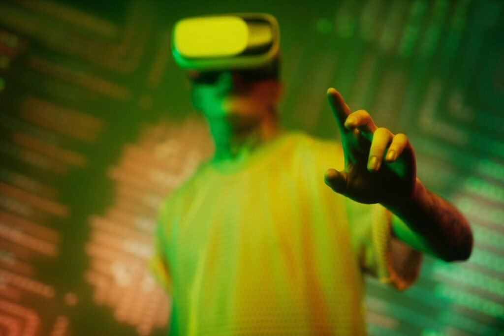A man engaging with a virtual environment using a VR headset in a futuristic setting.